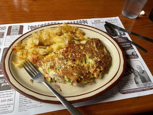 Western Omelet with home fries, passed on the toast.