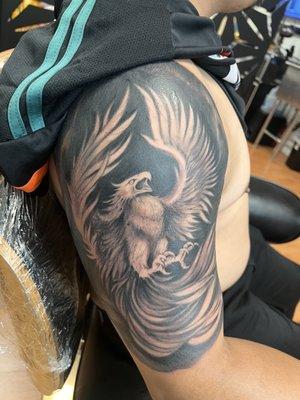 Phoenix tattoo on the arm