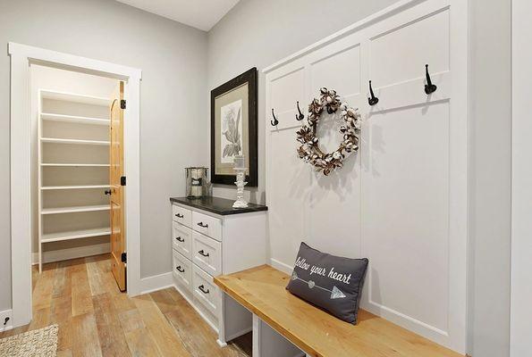 Custom Mudroom Cabinets with storage and charging station. Located in St. Cloud Minnesota.