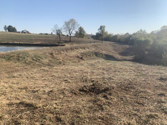 Finish work on the pond dam.