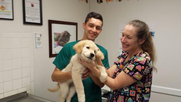 Anthony and Michelle taking care of one of our cute patients at BPAC