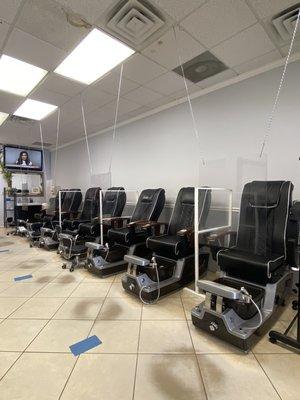 Our pedicure stations have plexiglass barriers between clients and staff. Sanitized between each client.