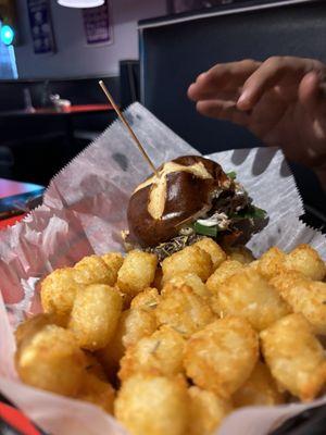 Tots and a pretzel bun burger