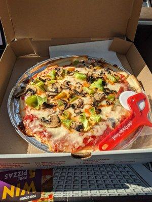 Gluten free pizza, peppers and mushrooms