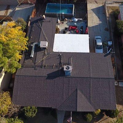 Roof replacement project with TPO patio in central Bakersfield, CA.