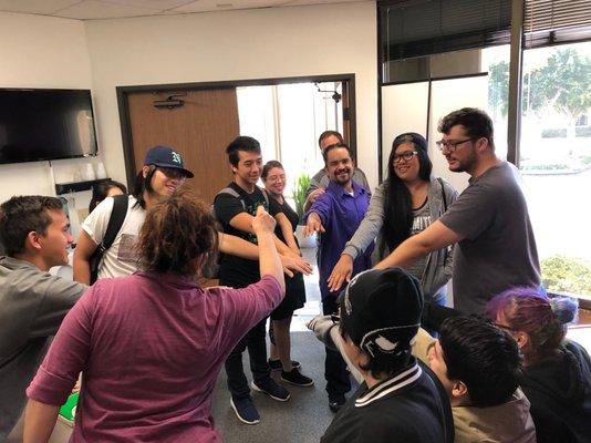 A team huddle before the event to get the party started!