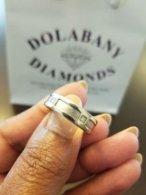 Dolabany restored the brushed finish on my husband's wedding band.