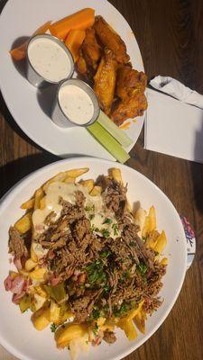 Wings and green chile queso fries added beef