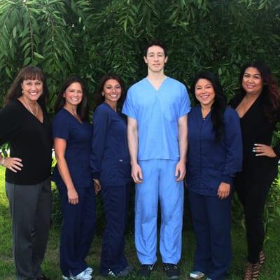 Our Pediatric Dentist Dr. Garrett Spruill and his team, Catherine, Jennie Ann, Sonia, Anna and Lenny.