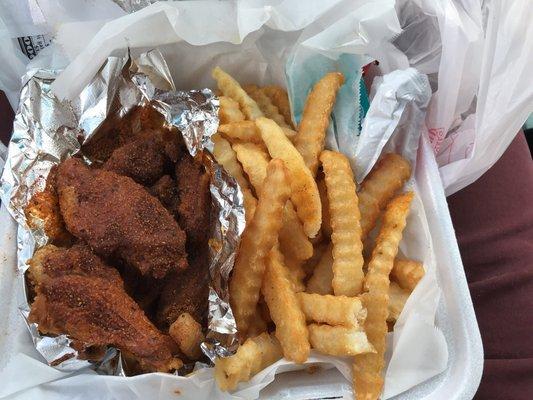 Cajun wings and fries.