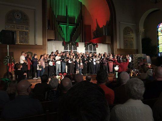 Sacramento Gay Men's Chorus performing Holiday Feast concert, singers from the audience were invited to join in on a couple songs