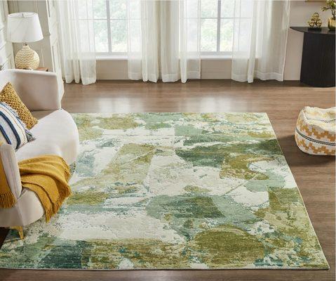 Explore our contemporary rug with a stunning mix of green shades, adding depth and elegance to any space. Visit Palace Rug Gallery!