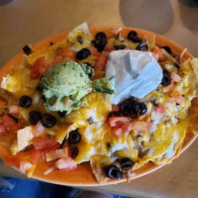 Chicken Fajita nachos w/no jalapeños.