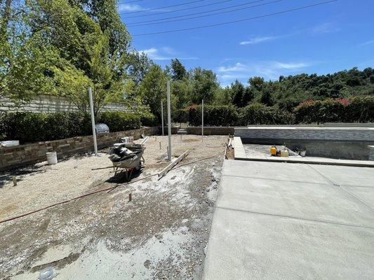 Footings poured, standing posts