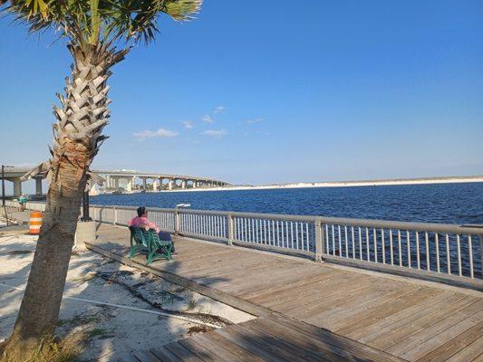 Looking northward towards the bridge. (that's my honey on the bench enjoying the view)