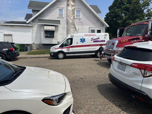 Fire and police out to support the lemonade stand for the local Humane Society