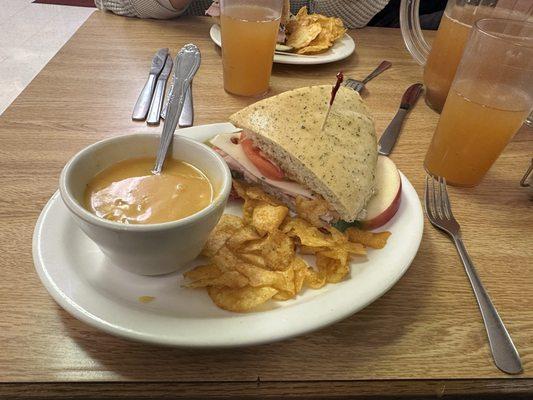 The club sandwich with a side of chicken tortilla soup