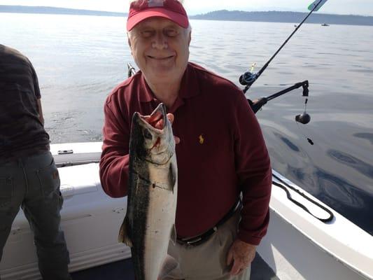 This is my uncle who was very happy catching his first salmon in many years.