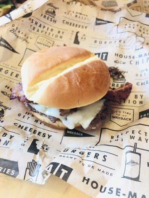 Build your own burger with Swiss cheese and grilled onions