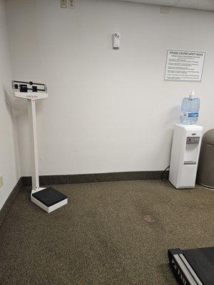 Weigh yourself and free purified water.  Also they have towels.