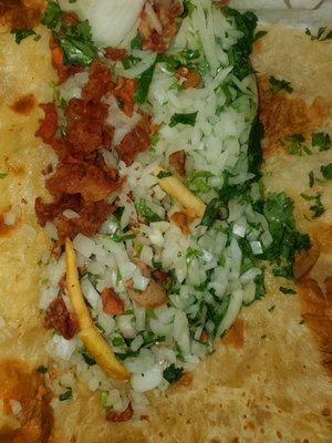 Tripa burrito no onion.