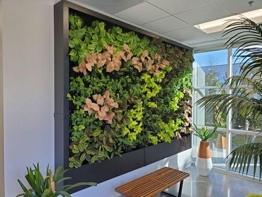 Grow wall in this corporate lobby brings so much life to the space