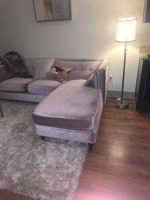 I ordered a pink couch with gold legs and circle pillows. This couch has brown legs and cylinder pillows .