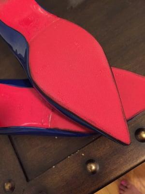 Louboutin red rubber bottom toe piece.