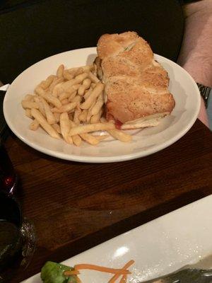 Chicken Parm sandwich with french fries