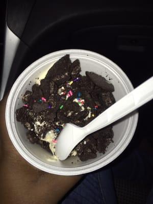 Vanilla froyo topped with Oreos and sprinkles