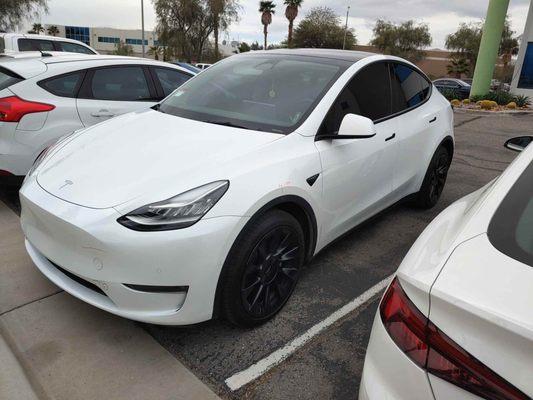 tesla model y in for some bodywork