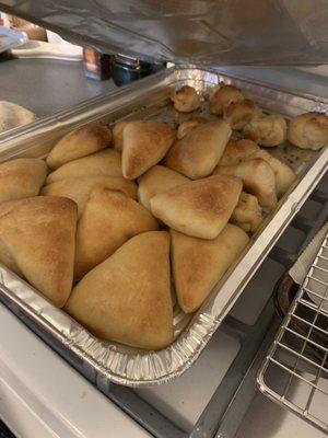 Full tray of fresh baked rolls & garlic knots came with our catering order (so good we couldn't wait to eat some before snapping the pic)