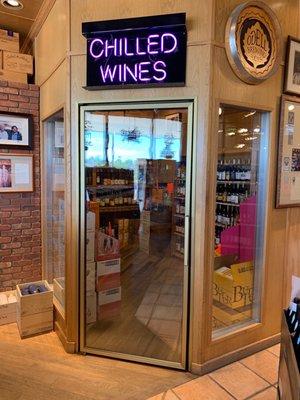 Chilled wine room with sparkling wines and boxed wines