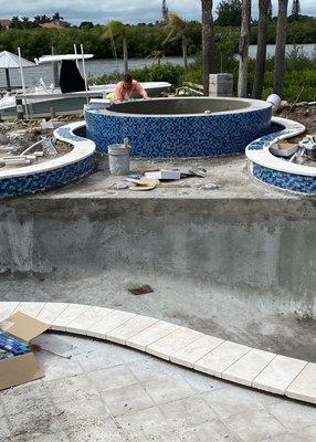 Adding a spa and sunshelf with LED multi color lights and bubblers to a older pool