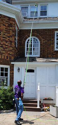 I'm using a water fed pole and brush to wash a 3rd story window