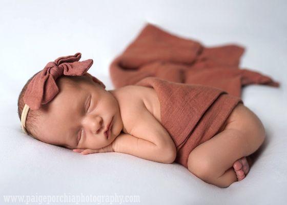 Newborn Girl on White Seamless