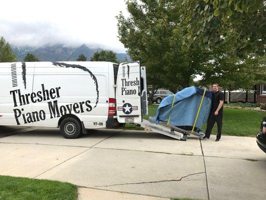 Moving a baby grand.