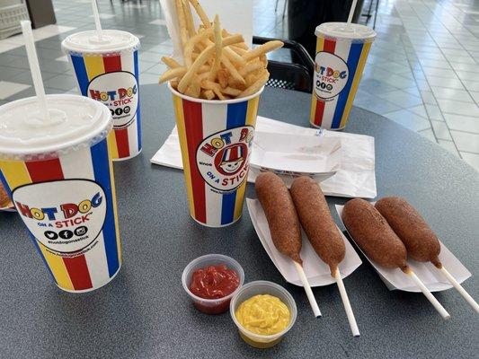 Sample platter, 2 beef and 2 American cheese sticks, fries, and lychee lemonade!