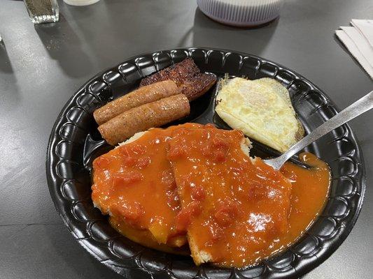 Tomato gravy, over easy, sausage link.