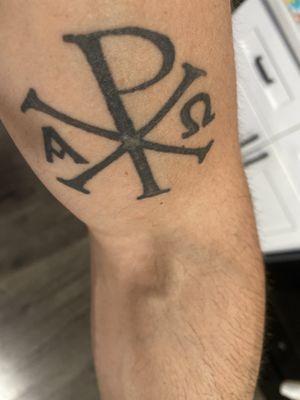 Chi Rho Cross. Should be all black. The trunk in the middle has lumps and the middle is fucked up.