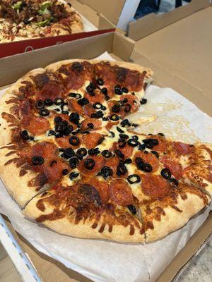 Large pepperoni & black olive pizza