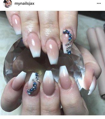 Ombré pink and white with rhinestone designs.Visit us on Instgram @Mynailsjax for more nail design inspirations.