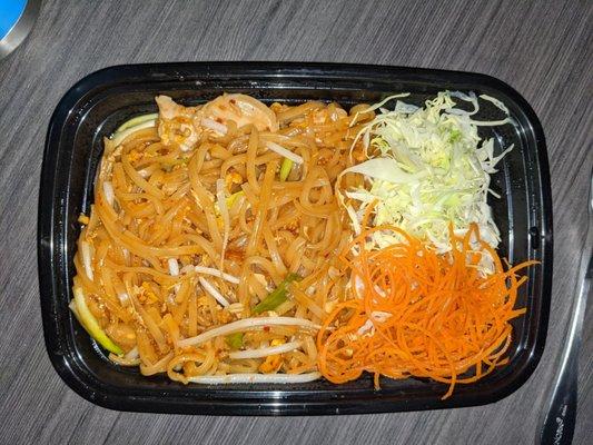 Chicken pad Thai with fresh carrots and cabbage. Phenomenal!