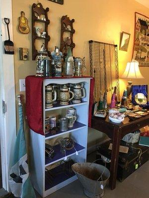 photo features some of out amazing vintage jewelry collection as well as our array of Beet Steins!