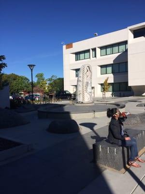 Statue in front of building