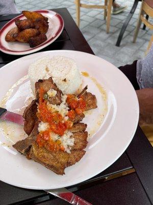 Chuletad fritas with white rice.