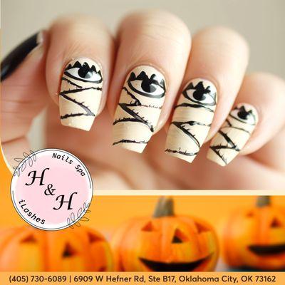 Halloween ready with a fresh set of nails. Bring on the celebrations!