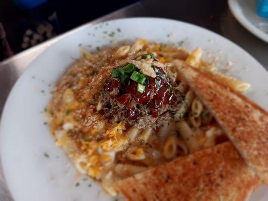 Pulled pork Mac N Cheese. So creamy and topped with smoked cheese and phenomenal smoked pork. Bbq was the perfect sweet and spice in it.