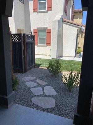 Pathway to the backyard, hand sculpted rocks, set nicely