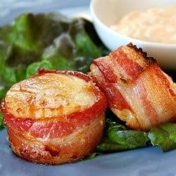 Bacon Wrapped Scallops: mouth-watering combination of plump white sea scallops, wrapped in a strip of lean bacon